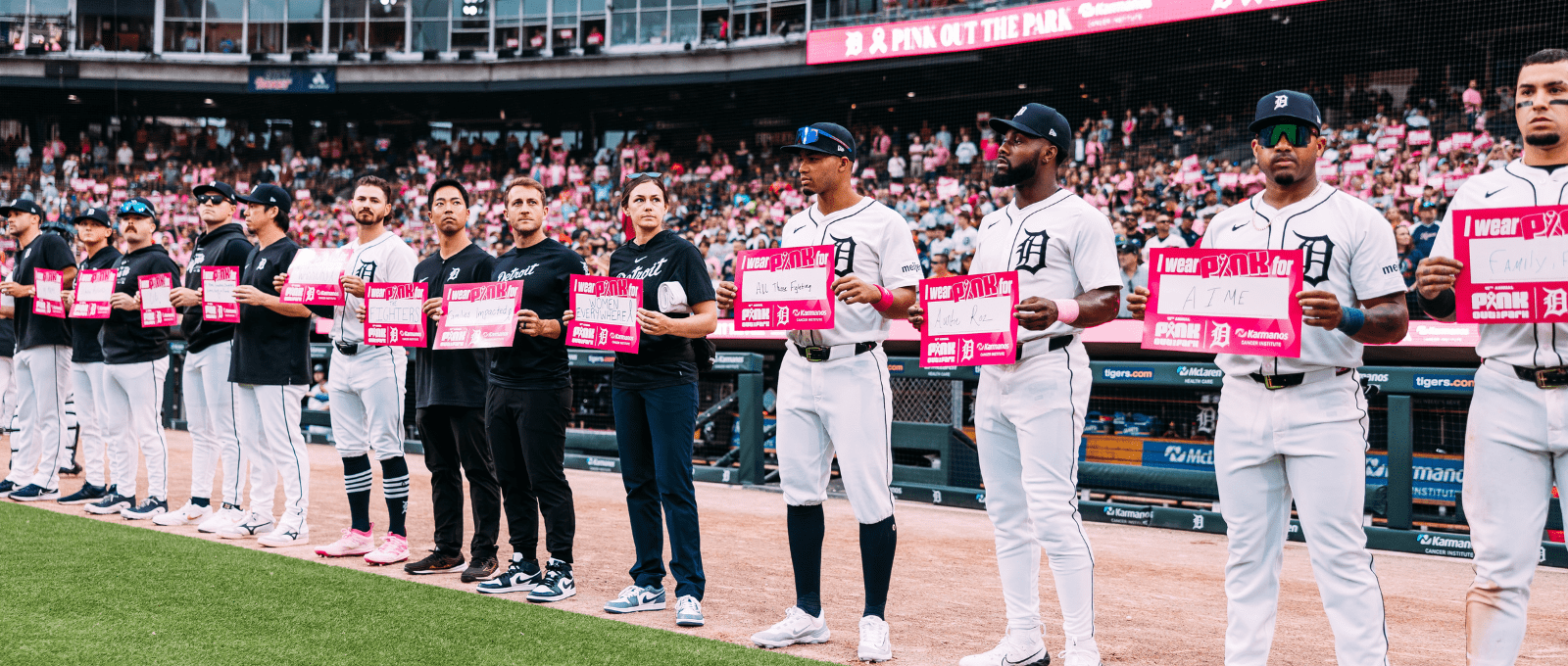 Detroit Tigers honor breast cancer survivors on field before the Pink Out the Park game at Comerica Park.